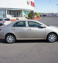 toyota corolla 2009 gold sedan gasoline 4 cylinders front wheel drive automatic 19153