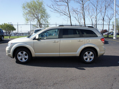 dodge journey 2010 gold suv sxt gasoline 6 cylinders front wheel drive automatic 19153