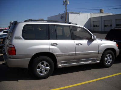 toyota land cruiser 2002 silver suv gasoline 8 cylinders 4 wheel drive automatic 79925