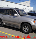toyota land cruiser 2002 silver suv gasoline 8 cylinders 4 wheel drive automatic 79925