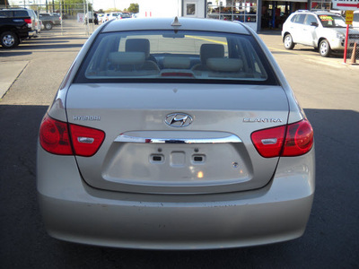 hyundai elantra 2010 gold sedan gasoline 4 cylinders front wheel drive automatic 79925