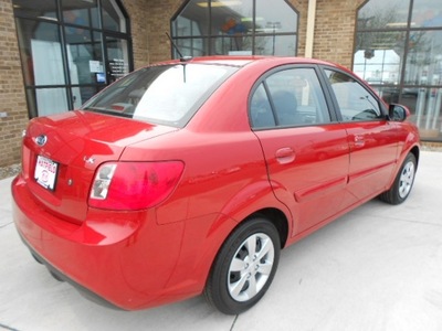 kia rio 2011 red sedan gasoline 4 cylinders front wheel drive not specified 43228