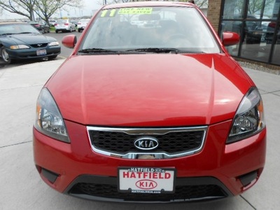 kia rio 2011 red sedan gasoline 4 cylinders front wheel drive not specified 43228