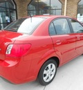 kia rio 2011 red sedan gasoline 4 cylinders front wheel drive not specified 43228