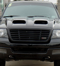 ford f 150 2005 black clearcoat lariat gasoline 8 cylinders 4 wheel drive automatic 62034