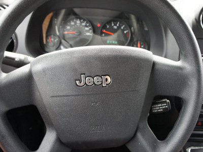 jeep patriot 2010 black suv sport gasoline 4 cylinders 2 wheel drive automatic 33021