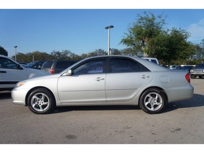 toyota camry 2002 silver sedan xle gasoline 4 cylinders front wheel drive automatic 33157