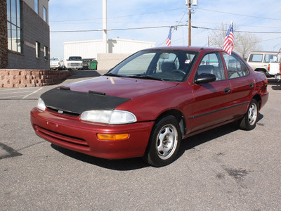 geo prizm 1994 red sedan gasoline 4 cylinders front wheel drive automatic 80229