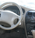 geo prizm 1997 beige sedan gasoline 4 cylinders front wheel drive automatic 80229