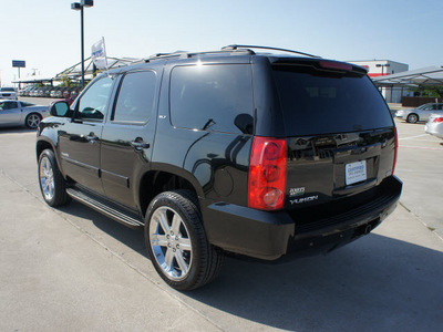 gmc yukon 2012 black suv slt flex fuel 8 cylinders 4 wheel drive automatic 76087