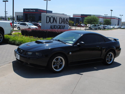 ford mustang 2004 black coupe gt deluxe gasoline 8 cylinders rear wheel drive automatic with overdrive 76018