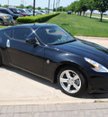 nissan 370z 2011 black coupe gasoline 6 cylinders rear wheel drive 6 speed manual 76018