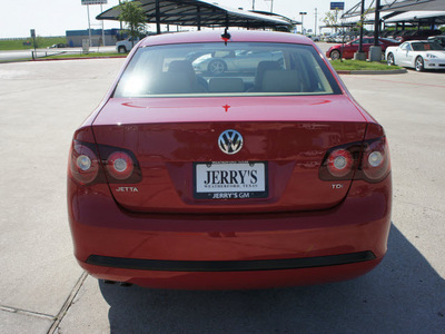 volkswagen jetta 2009 red sedan tdi diesel 4 cylinders front wheel drive automatic 76087