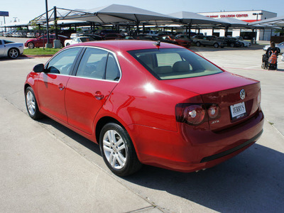 volkswagen jetta 2009 red sedan tdi diesel 4 cylinders front wheel drive automatic 76087