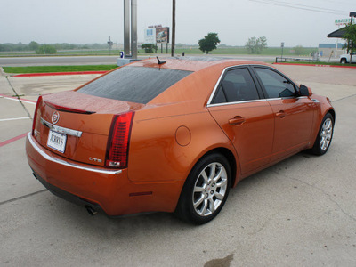 cadillac cts 2008 orange sedan gasoline 6 cylinders rear wheel drive automatic 76087