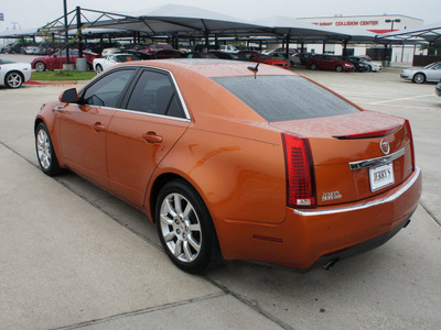 cadillac cts 2008 orange sedan gasoline 6 cylinders rear wheel drive automatic 76087