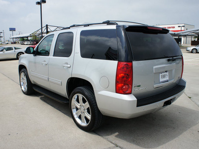 gmc yukon 2012 silver suv slt flex fuel 8 cylinders 4 wheel drive automatic 76087