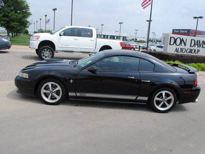 ford mustang 2003 black coupe mach 1 premium gasoline 8 cylinders rear wheel drive 5 speed manual 76018