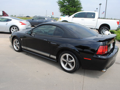 ford mustang 2003 black coupe mach 1 premium gasoline 8 cylinders rear wheel drive 5 speed manual 76018