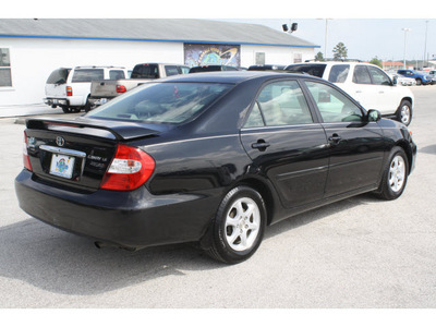 toyota camry 2002 black sedan le gasoline 4 cylinders front wheel drive automatic 77388