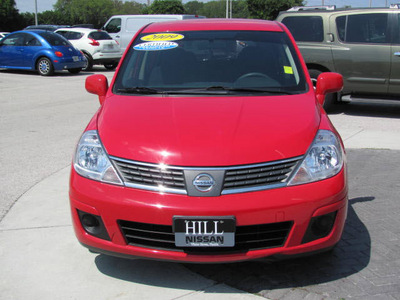 nissan versa 2009 red hatchback gasoline 4 cylinders front wheel drive automatic 33884