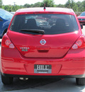 nissan versa 2009 red hatchback gasoline 4 cylinders front wheel drive automatic 33884