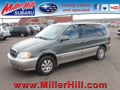 kia sedona 2004 dk  green van ex gasoline 6 cylinders front wheel drive automatic with overdrive 55811