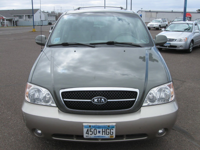 kia sedona 2004 dk  green van ex gasoline 6 cylinders front wheel drive automatic with overdrive 55811