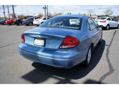 ford taurus 2007 lt  blue sedan se gasoline 6 cylinders front wheel drive automatic with overdrive 08902