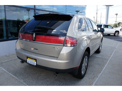 lincoln mkx 2010 gold suv gasoline 6 cylinders front wheel drive automatic with overdrive 08902