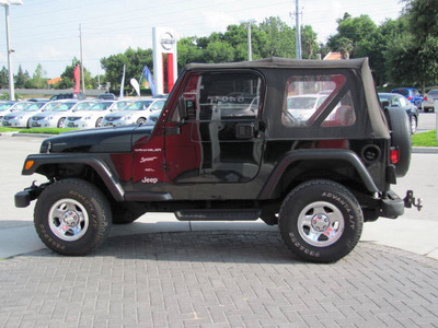 jeep wrangler 2002 black suv gasoline 6 cylinders 4 wheel drive standard 33884