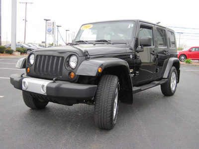 jeep wrangler unlimited 2010 black suv sahara gasoline 6 cylinders 4 wheel drive automatic with overdrive 46410