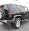 jeep wrangler unlimited 2010 black suv sahara gasoline 6 cylinders 4 wheel drive automatic with overdrive 46410