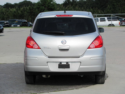 nissan versa 2010 silver hatchback gasoline 4 cylinders front wheel drive automatic 33884