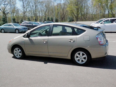 toyota prius 2009 tan hatchback standard hybrid 4 cylinders front wheel drive automatic 56001