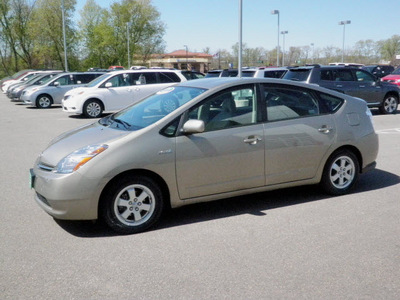 toyota prius 2009 tan hatchback standard hybrid 4 cylinders front wheel drive automatic 56001