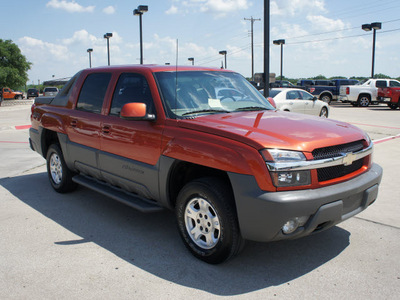 chevrolet avalanche 2002 orange suv z71 gasoline v8 4 wheel drive automatic 76087