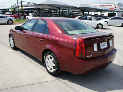 cadillac cts 2003 red sedan gasoline 6 cylinders dohc rear wheel drive automatic 76087