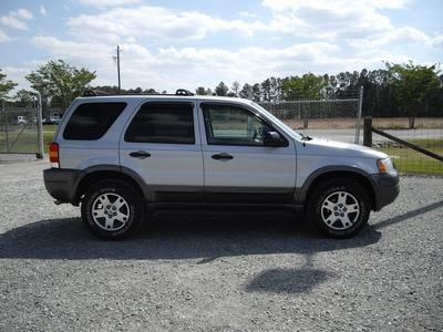 ford escape 2003 silver suv xlt popular gasoline 6 cylinders dohc front wheel drive automatic 27569