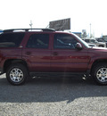 chevrolet tahoe 2004 red suv z71 flex fuel 8 cylinders 4 wheel drive automatic 27569