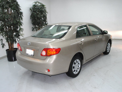 toyota corolla 2010 tan sedan le gasoline 4 cylinders front wheel drive automatic 91731