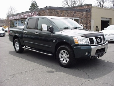 nissan titan 2004 dk  green pickup truck le gasoline 8 cylinders 4 wheel drive automatic 06019