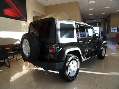 jeep wrangler 2012 black suv unlimited sport gasoline 4 cylinders 4 wheel drive automatic 60915