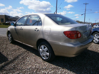 toyota corolla 2006 tan sedan gasoline 4 cylinders front wheel drive automatic with overdrive 13212
