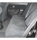 nissan versa 2011 black hatchback gasoline 4 cylinders front wheel drive automatic 77090