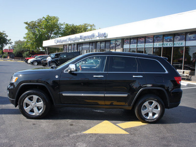 jeep grand cherokee 2011 dk  gray suv overland gasoline 8 cylinders 4 wheel drive automatic 33021