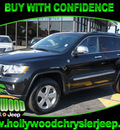 jeep grand cherokee 2011 dk  gray suv overland gasoline 8 cylinders 4 wheel drive automatic 33021