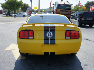 ford mustang 2006 yellow coupe gasoline 6 cylinders rear wheel drive 5 speed manual 33021