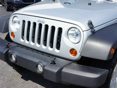 jeep wrangler unlimited 2012 silver suv sport gasoline 6 cylinders 4 wheel drive automatic 33021
