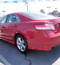 toyota camry 2010 red sedan se gasoline 4 cylinders front wheel drive automatic 32401
